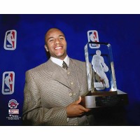 Unsigned Toronto Raptors Damon Stoudamire Fanatics Authentic Holding 1995-96 NBA Rookie of the Year Trophy Photograph